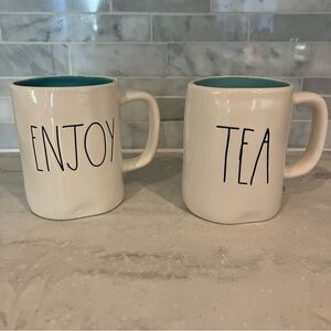 Rae Dunn Enjoy Tea white mugs with black print / teal inside.